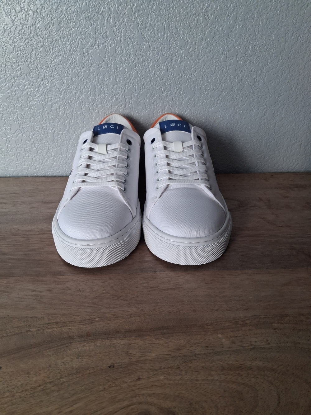 Loci White Low-Top Sneakers with Blue Heel Tab and Orange Accent. No Box